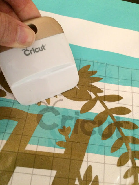 Make an easy monogrammed canvas wall art using your Cricut Explore.