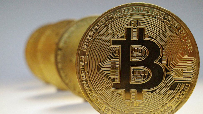 Bitcoin drops below $34,000 over the weekend, extending Friday’s losses
