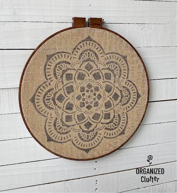 Photo of framed stenciled mandala on burlap