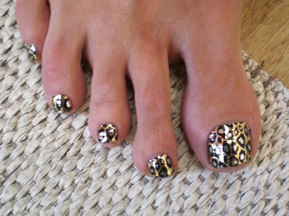 I took a picture of this girl's toe nails, she had a leopard minx design on.