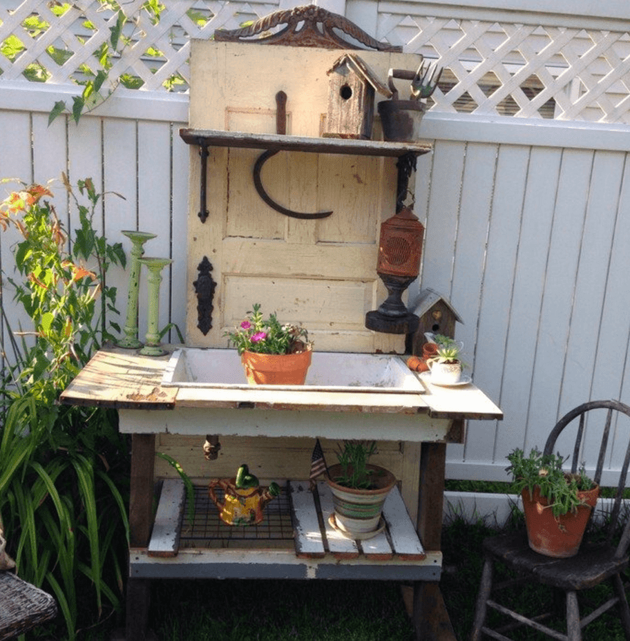 15 Brilliant DIY Ways To Upcycle Your Door - Potting Table