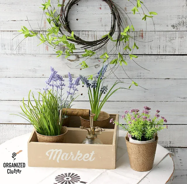 Photo of a drawer repurposed as a garden caddy.