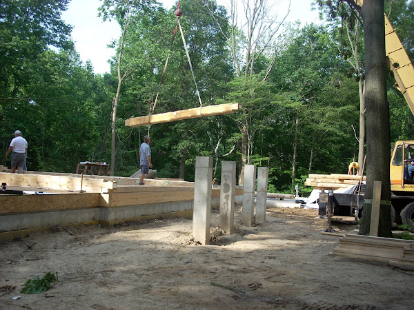 One of the first timbers being lifted