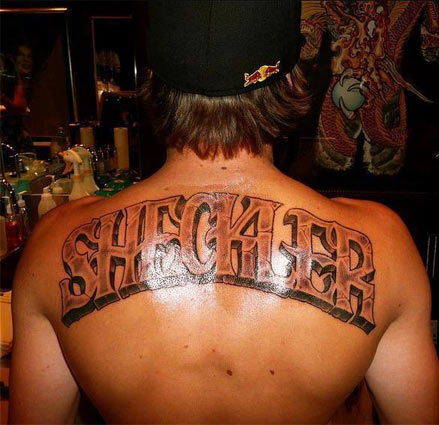 He has sick tattoos on his back 
