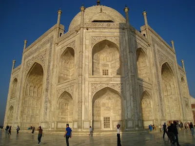 he Taj Mahal in Agra, India, showcasing its iconic white marble architecture.