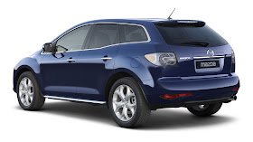 Rear 3/4 view of blue 2011 Mazda CX-7