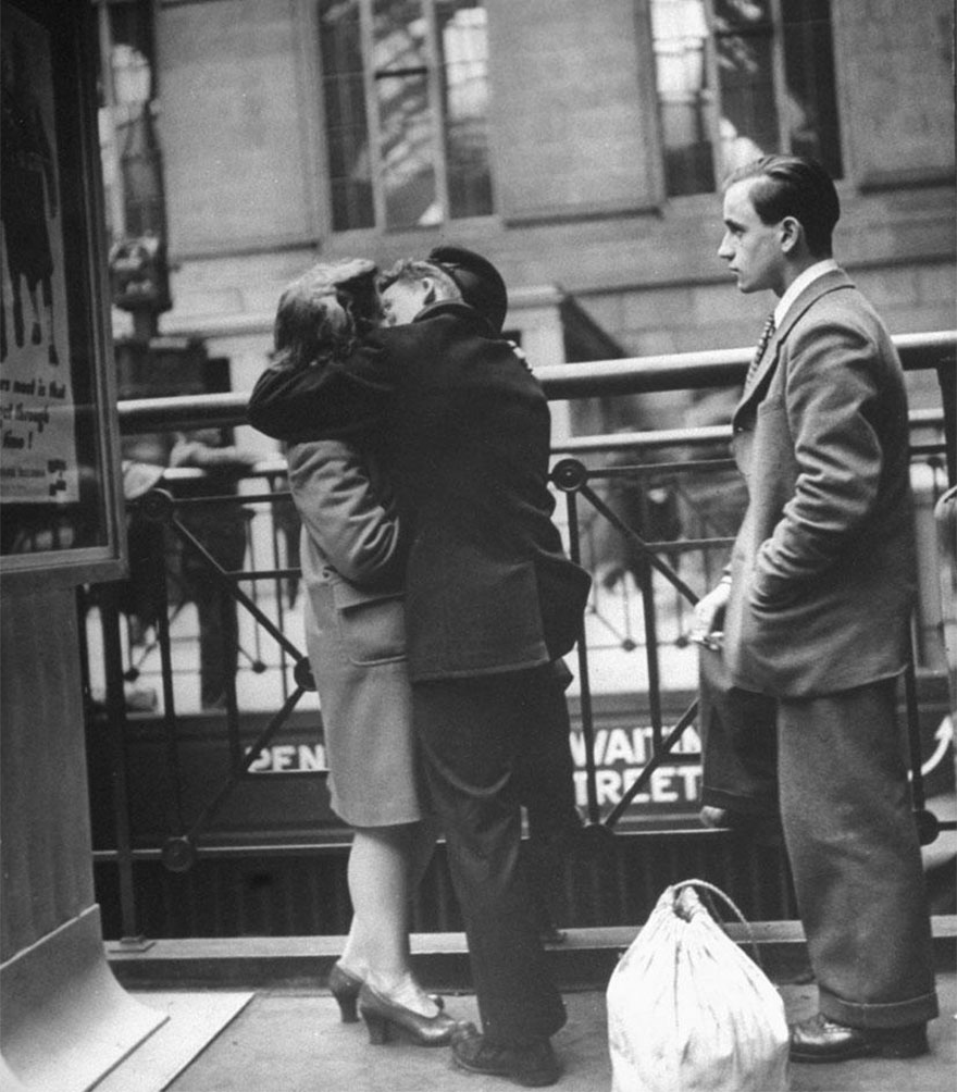 60 + 1 Heart-Warming Historical Pictures That Illustrate Love During War - Couple In Penn Station Sharing Farewell Kiss Before He Ships Off To War, 1943