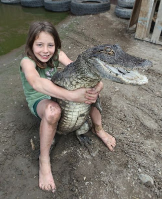 Samantha with her parents teach people how to tackle the massive toothy predators.