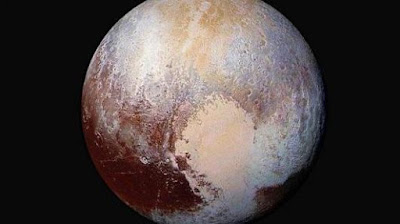 Lubang-lubang Kecil Misterius di Permukaan Pluto