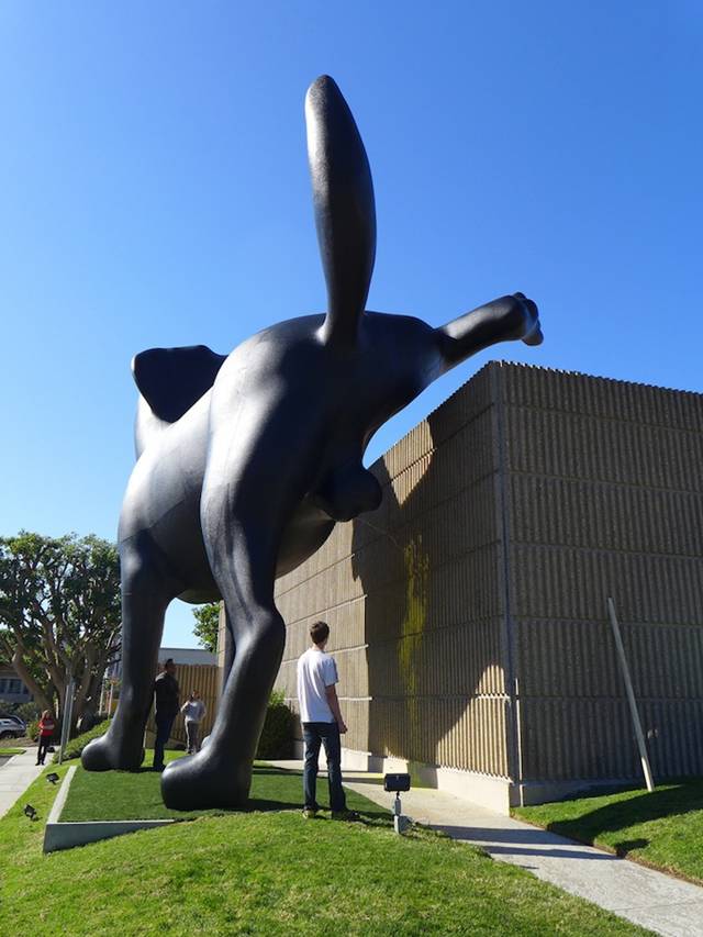 Giant Labrador Sculpture Marks Its Territory on a Museum A 28-foot-tall sculpture of a black Labrador relieving itself is currently installed on the side of the Orange County Museum of Art (OCMA) in Newport Beach, California. The installation, known simply as Bad Dog, is a new outdoor piece by artist Richard Jackson that is claiming its temporary territory throughout the run of the 74-year-old artist's first retrospective exhibit titled Richard Jackson: Ain't Painting a Pain.