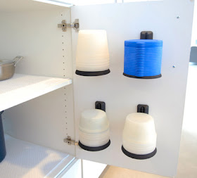 nesting and stacking food storage containers, mounted on a cabinet door