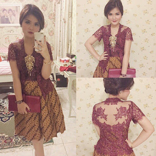 Kebaya broklat ungu dengan rok batik parang kecil