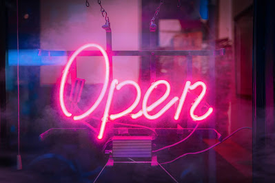neon open sign in window