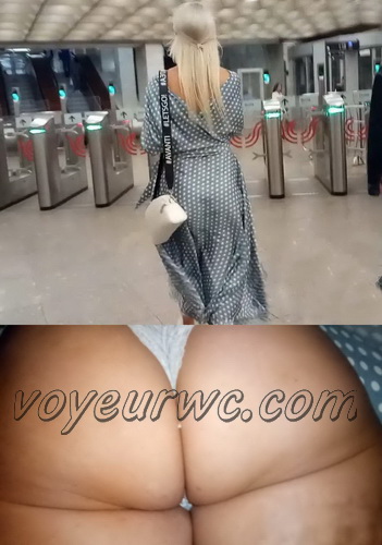 Upskirts 4768-4775 (Secretly taking an upskirt video of beautiful women on escalator)