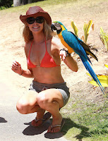 Denise Richards On Vacation In Maui In Her Bikini And Playing With Rental Birds