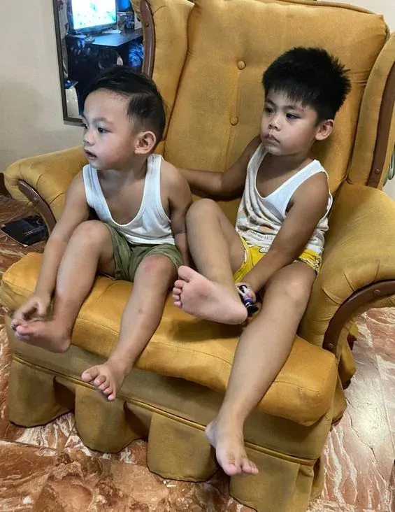 Our two toddler boys Miguel and Rafa watching nursery rhymes together and sharing a tender moment