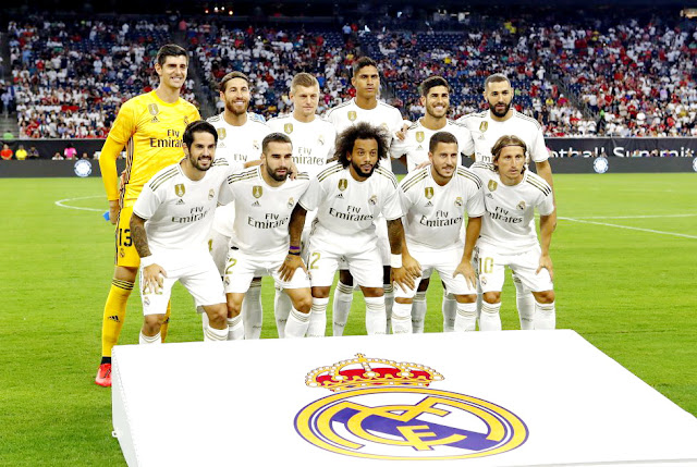 REAL MADRID C. F. Temporada 2019-20. Courtois, Sergio Ramos, Toni Kroos, Varane, Marco Asensio y Benzema; Isco, Carvajal, Marcelo, Eden Hazard y Luka Modric. F. C. BAYERN DE MUNICH 3 (Corentin Tolliso, Lewandowski, Gnabry) REAL MADRID C. F. 1 (Rodrygo). 20/07/2019. Partido amistoso perteneciente a la International Champions Cup. Houston, Estados Unidos, NRG Stadium.