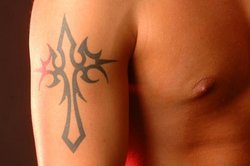 Tribal Cross arm Tattoos 