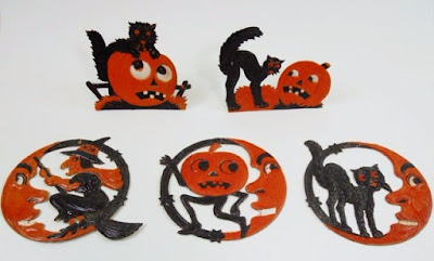 Black cats and Jack O'Lanterns and quarter moon pieces with witch, pumpkin goblin, and arched cat.