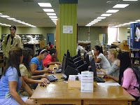 Students at computer stations in the Library