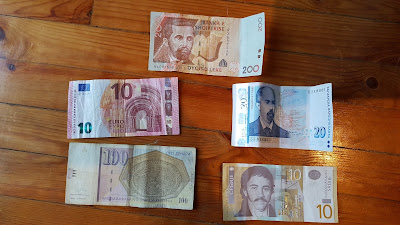 Traveling between countries requires different currencies  (the Euro, Serbian dinar, Albanian lek, Bulgarian lev, and Macedonian/FYROM denar)