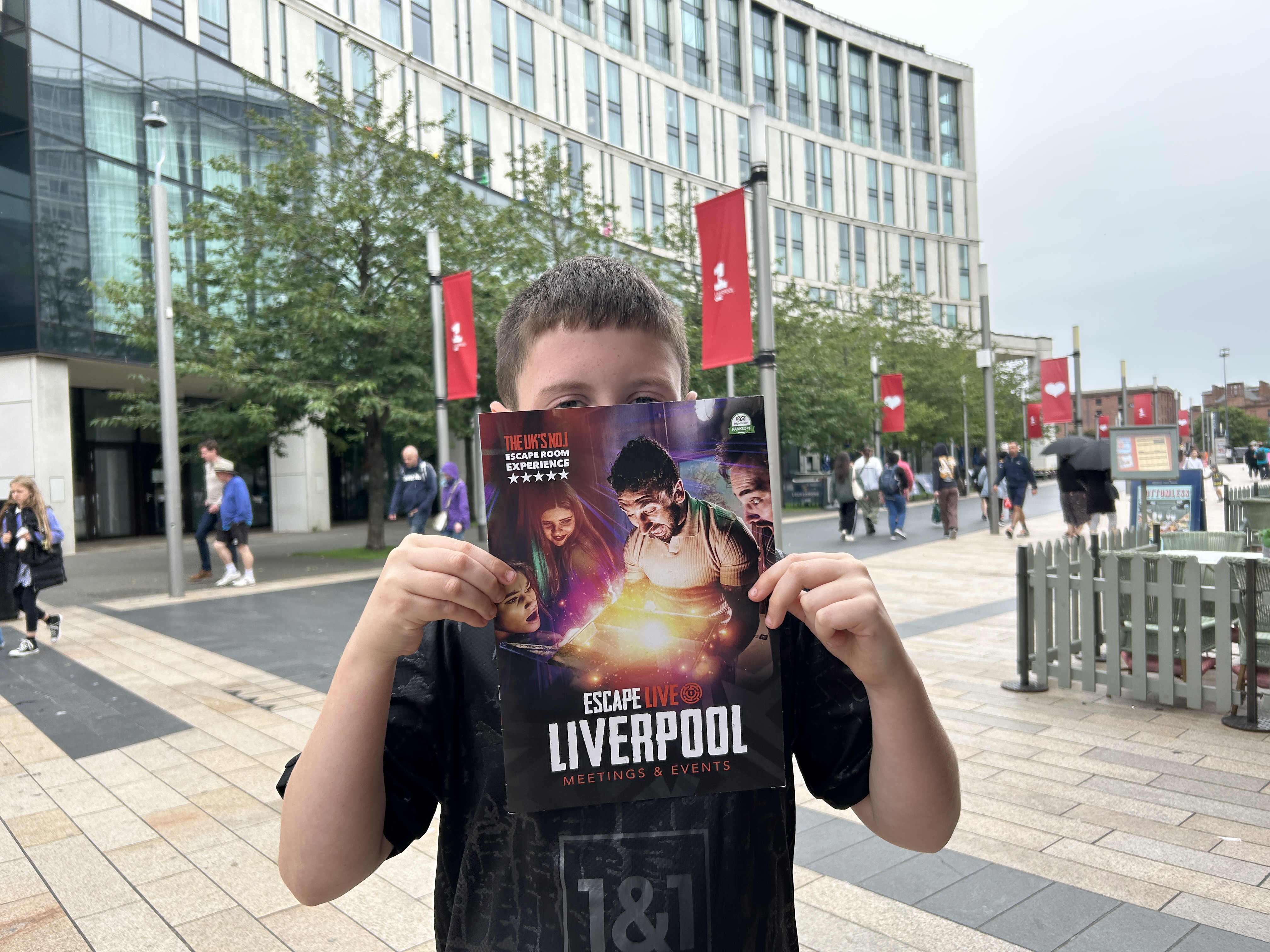 boy holding an escape live photo