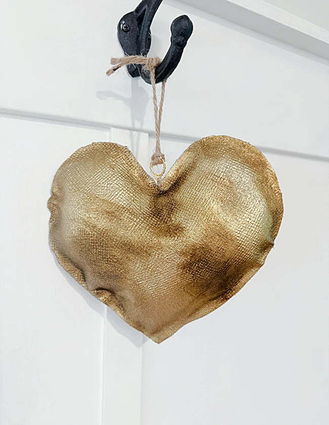 hanging gold heart on hook