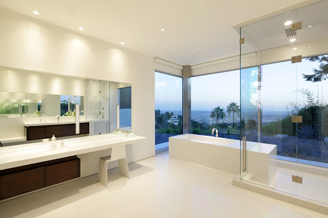 Large minimal bathroom with glass walls 
