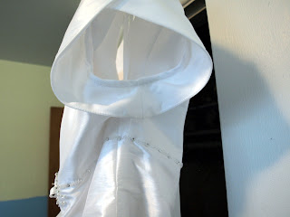 Side view of a petal sleeve in a wedding dress