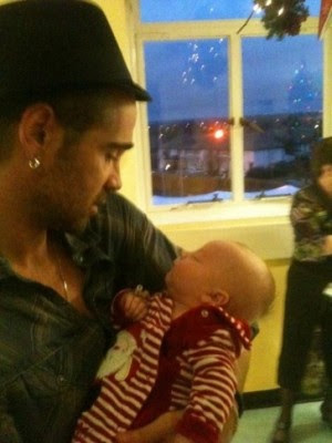 Colin Farrell spent some of his Christmas day passing out presents to