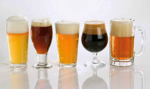 Five glass containers for beer