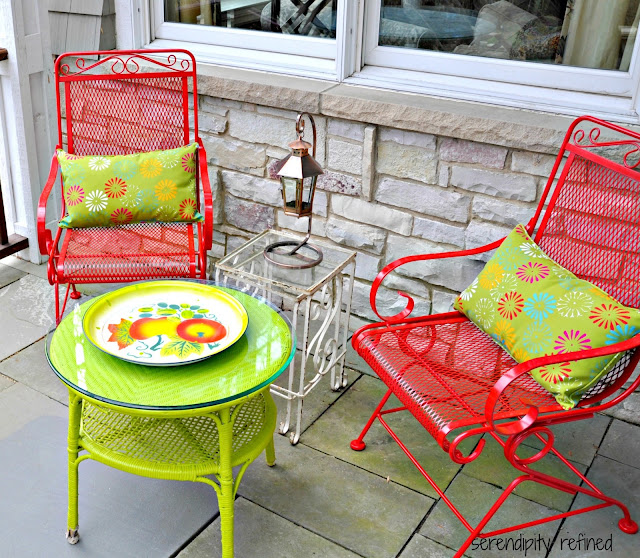Spray painted brightly colored wicker and Wrought Iron Patio furniture makeover