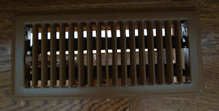 Grille in dining room floor