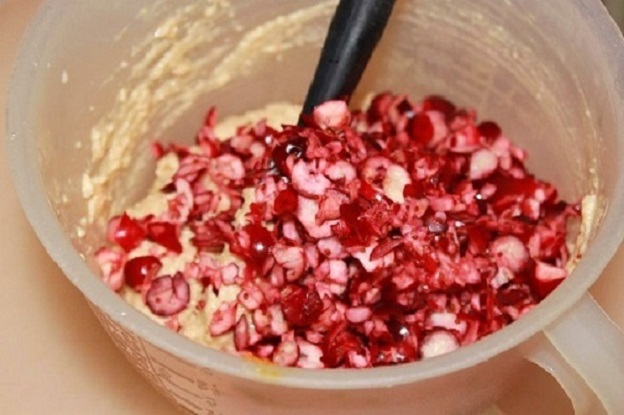 cut up raw cranberries for scones