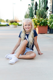 little girl outfit idea casual white sneakers abercrombie hairstyle braids pigtail buns