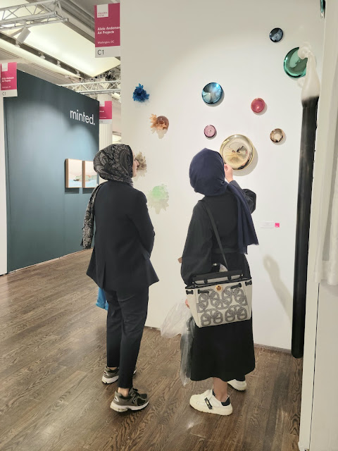 Art collectors admire Seth Fairweather's work at the AAFNYC Fall 2023