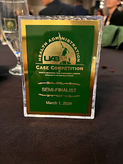 A rectangular shaped award for the University of Alabama Birmingham Health Administration Case Competition, it says "SEMI-FINALIST" in the middle.