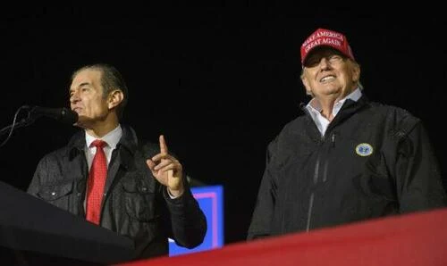 Pennsylvania Republican U.S. Senate candidate Dr. Mehmet Oz joins former President Donald Trump on stage during a rally in support of his campaign at the Westmoreland County Fairgrounds in Greensburg, Penn., on May 6, 2022.