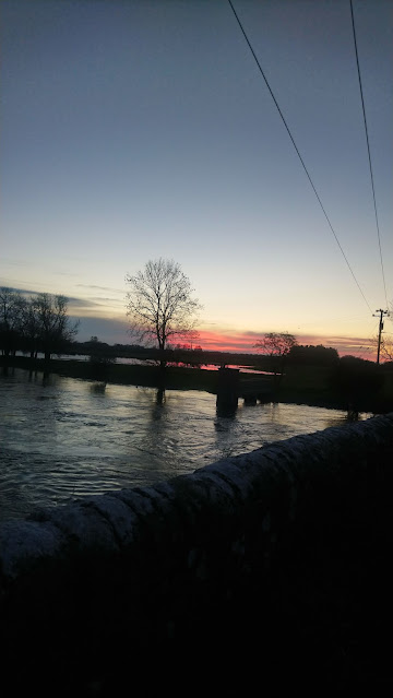 Sunset at a very high river