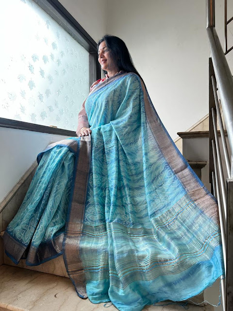 Unraveling the Turquoise Blue Pashmina Silk Shibori Hand-Dyed Saree with Zari Border