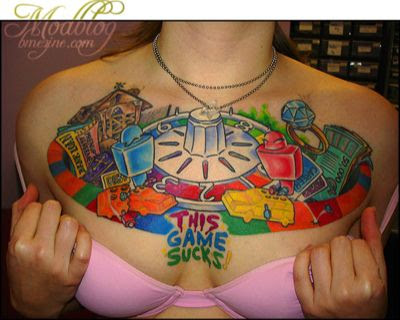 A colorful tattoo on chest and biceps