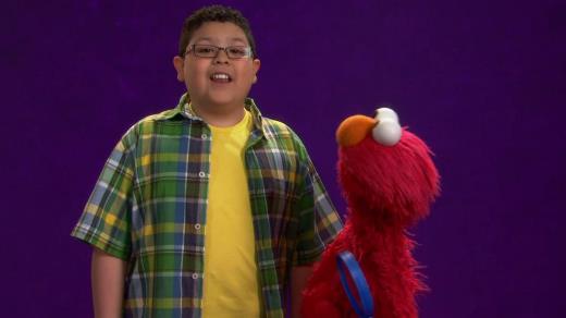 Sesame Street Episode 4281. Rico Rodriguez and Elmo talks about the word magnify.