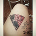 triángulo con rosas. roses and triangle tattoo. hipster tattoo