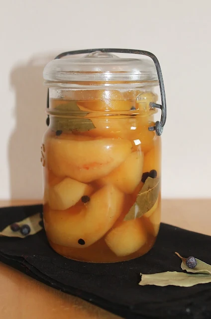 Finished jar of pickled quince.