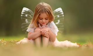 Young girl with Angel wings