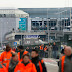 People leave the scene of explosions at Zaventem airport 