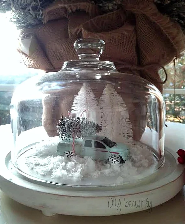 Create this wintry scene from dollar store items! See more at www.diybeautify.com