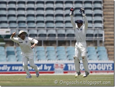 Sachin Tendulkar, right, and wicket keeper Wriddhiman Saha of India successfully appeal the catch of Ryan Broad of Australia