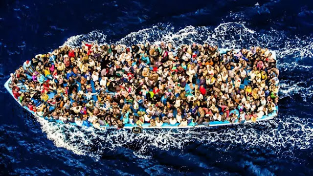 Boats floating in the Mediterranean with illegal immigrants