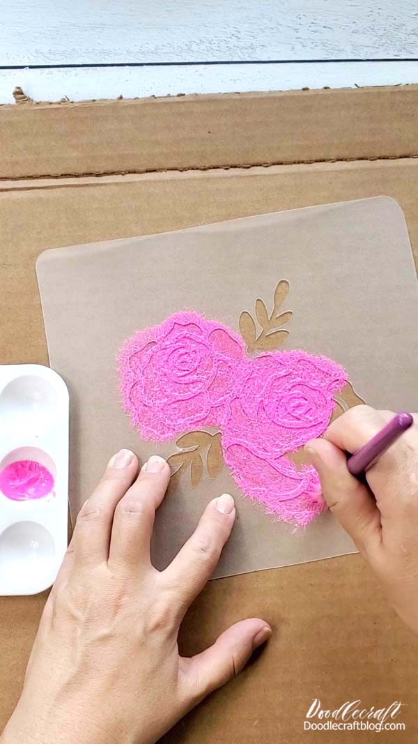 Just daub the paint on the stencil in an "up and down" movement, don't push or pull--as this can push paint under the plastic stencil.